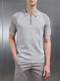 Knitted Raglan Colour Block Zip Polo In Stone