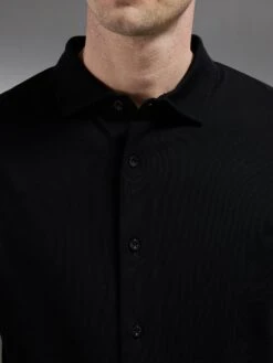 Mercerised Interlock Short Sleeve Button Through Shirt In Black 10 Mercerised Interlock Short Sleeve Button Through Shirt In Black -Cheap Shirts Shop MERCERISED INTERLOCK BUTTON THROUGH SHIRT IN BLACK 4646