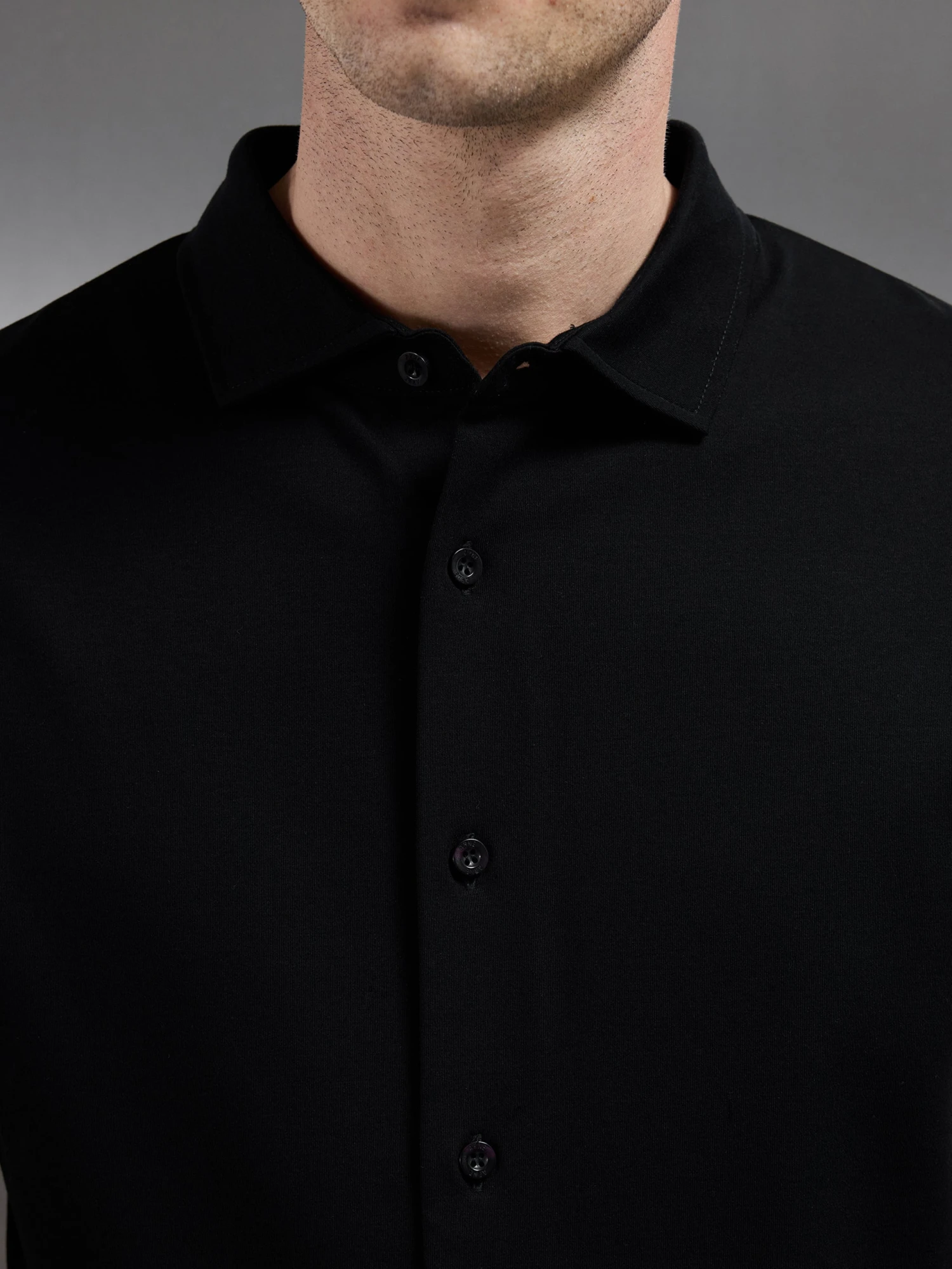 Mercerised Interlock Short Sleeve Button Through Shirt In Black 5 Mercerised Interlock Short Sleeve Button Through Shirt In Black - Image 3