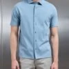 Mercerised Interlock Short Sleeve Button Through Shirt In Light Blue 2 Mercerised Interlock Short Sleeve Button Through Shirt In Light Blue -Cheap Shirts Shop MERCERISED INTERLOCK BUTTON THROUGH SHIRT IN LIGHTBLUE 4699